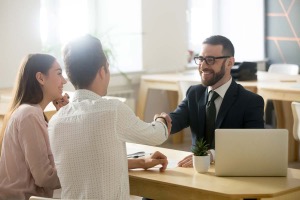 A couple meeting with a banker.