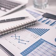 Assorted financial documents on a table.