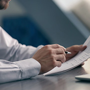 A man reviewing financial documents.